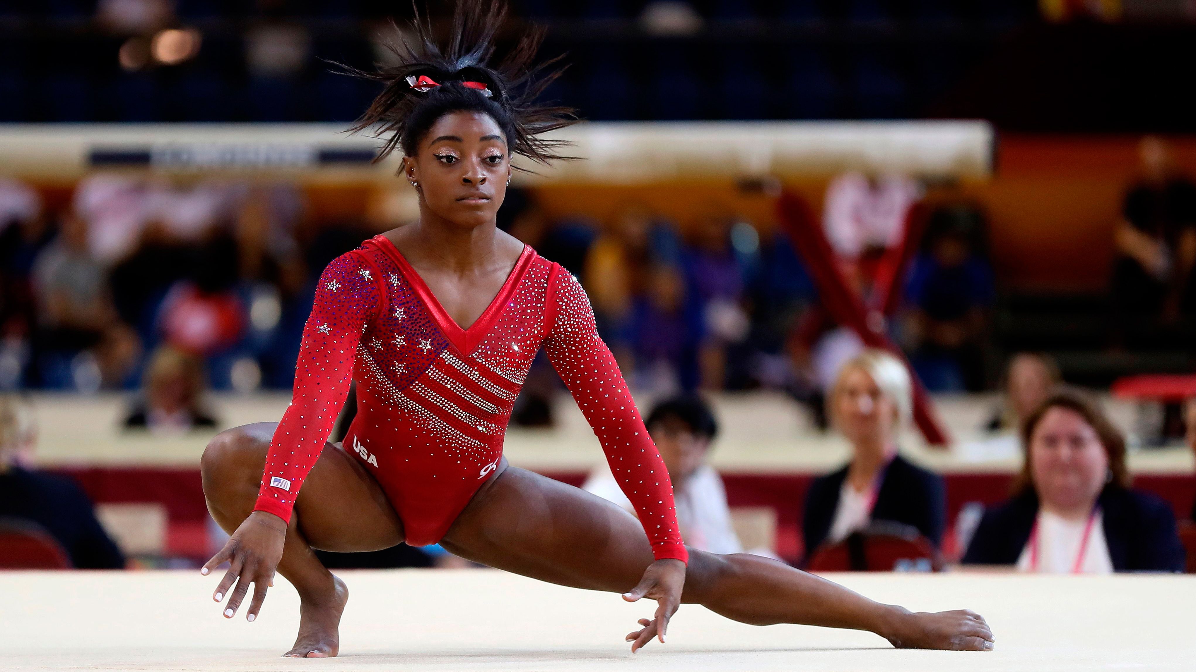 simone biles COI